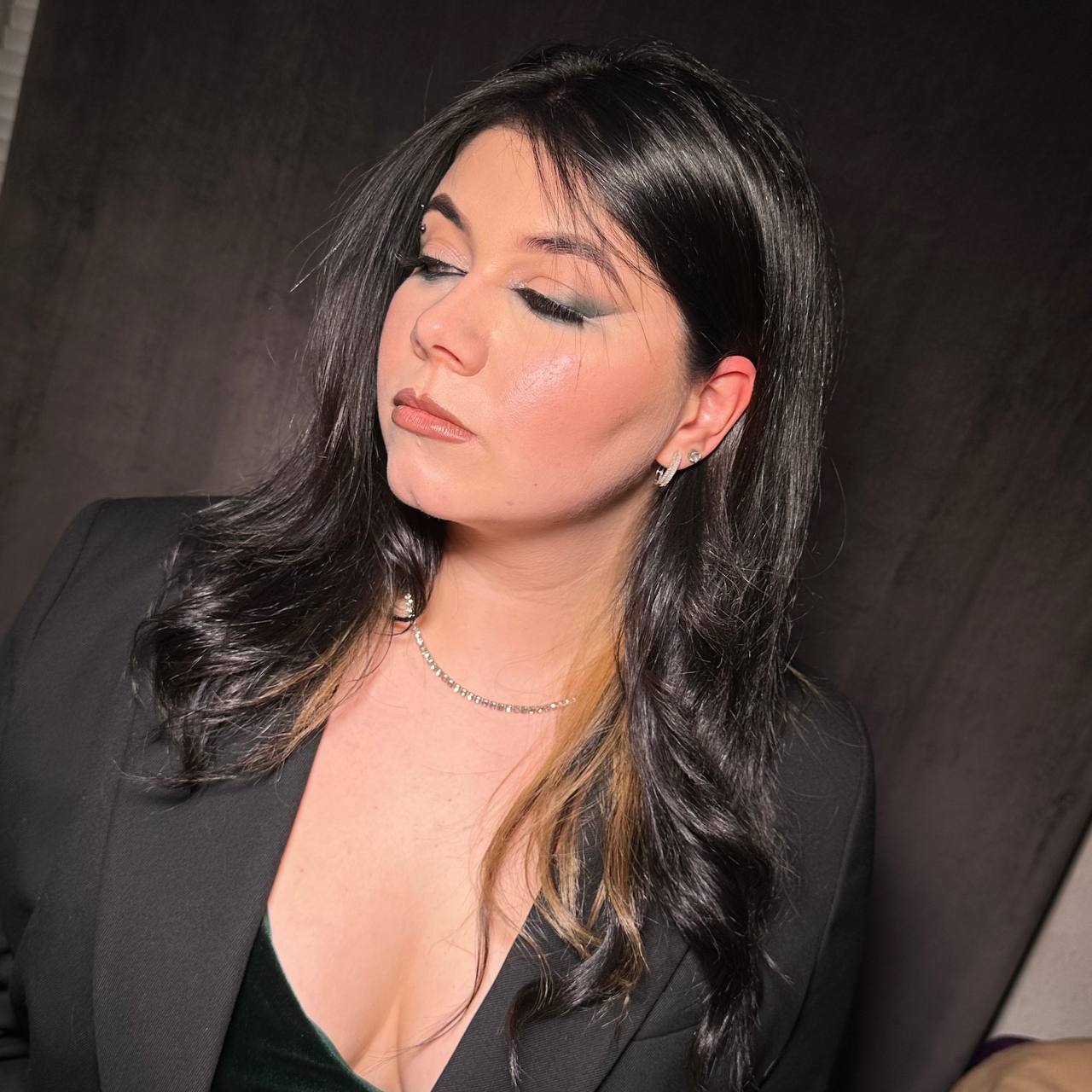 Smoky eye and sleek dark hair