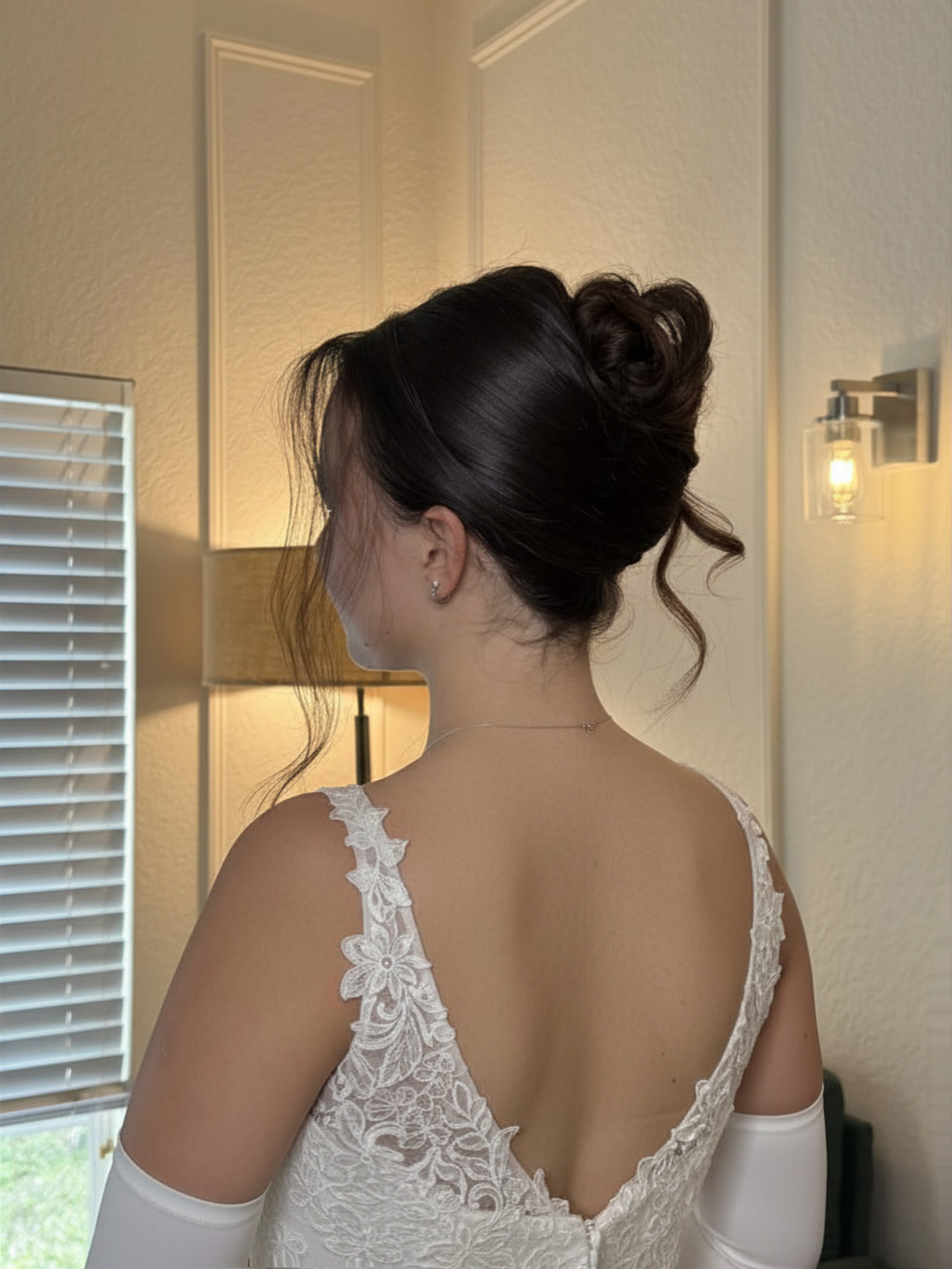 High bun with lace gown back detail