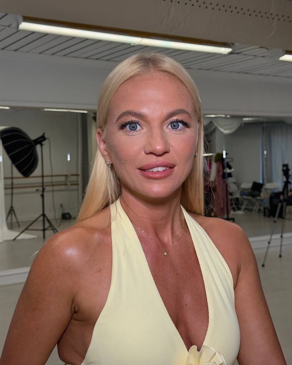 Bright blonde natural glam in studio